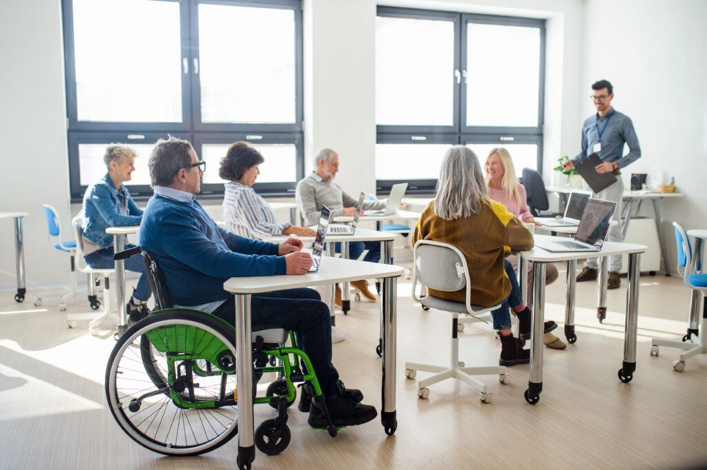 Active In A Wheelchair-Man in a College Class