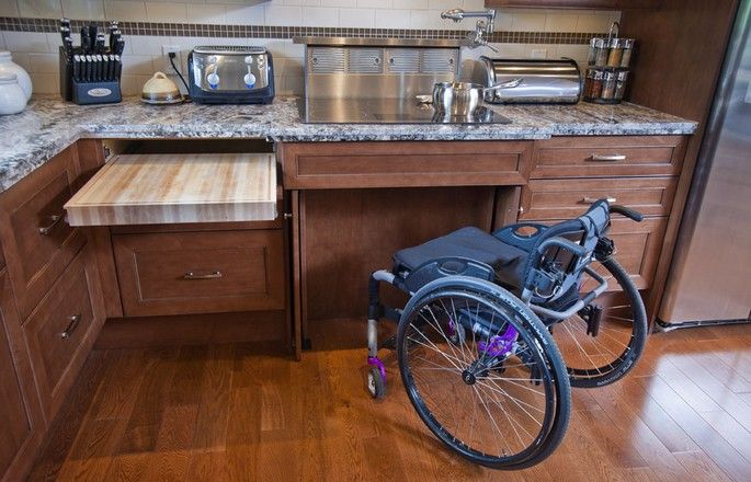 ADA Kitchen - wheelchair in front of cutting board