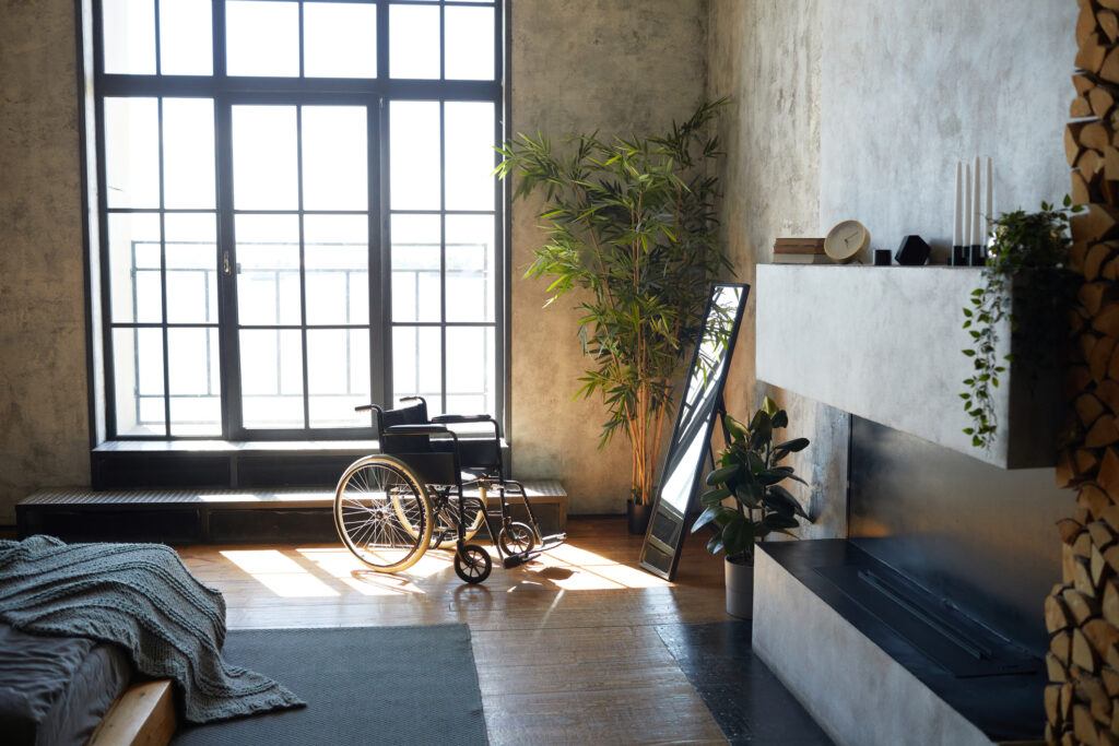 ADA Compliant Bedroom - Wheelchair in window of bedroom