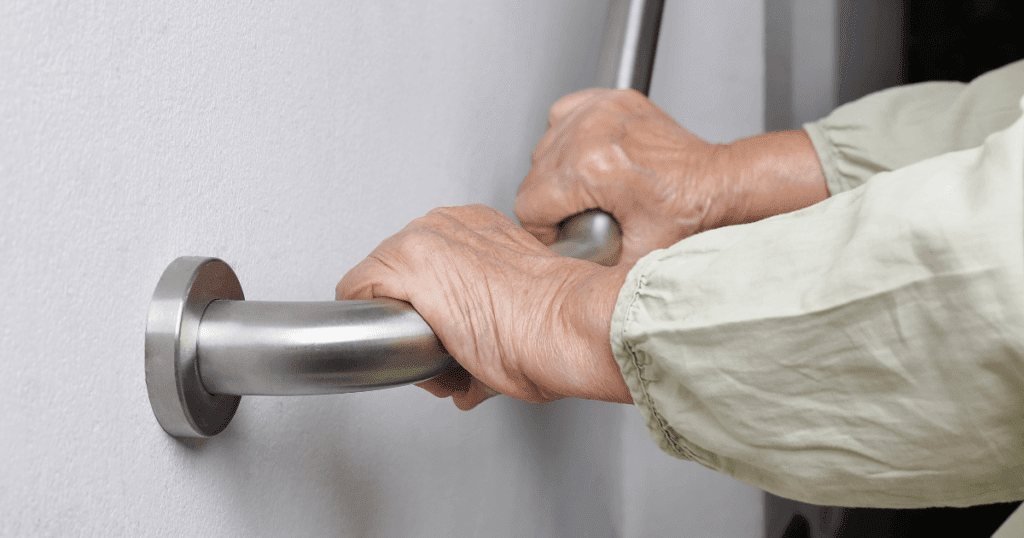 How to Install A Grab Bar In A Fiberglass Shower: Elderly Woman Grabbing a Bar