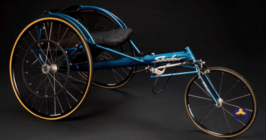 The History Of The Wheelchair-three wheel wheelchair