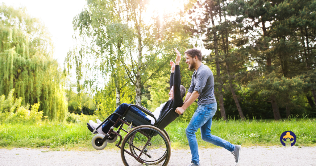 The History Of The Wheelchair-man pushing grandpa in wheelchir