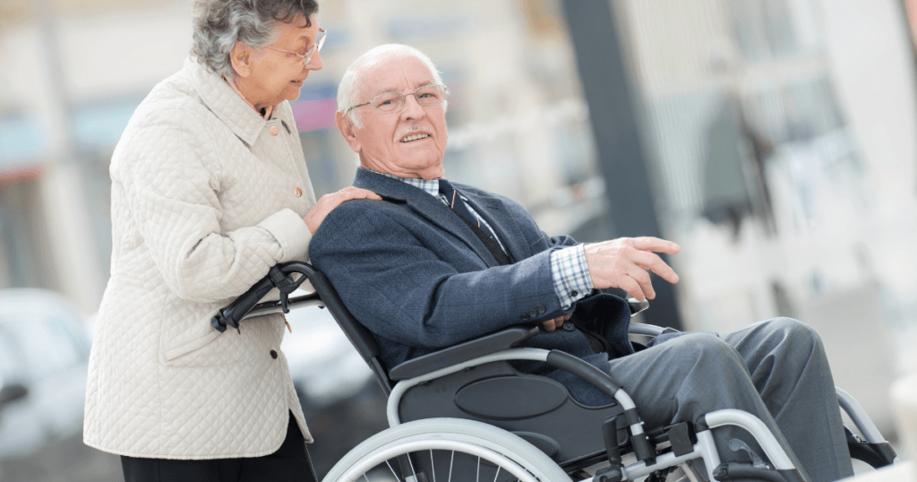elderly couple going up a ramp