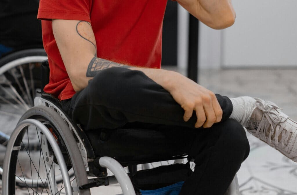 Young man in a wheelchair hanging out being cool