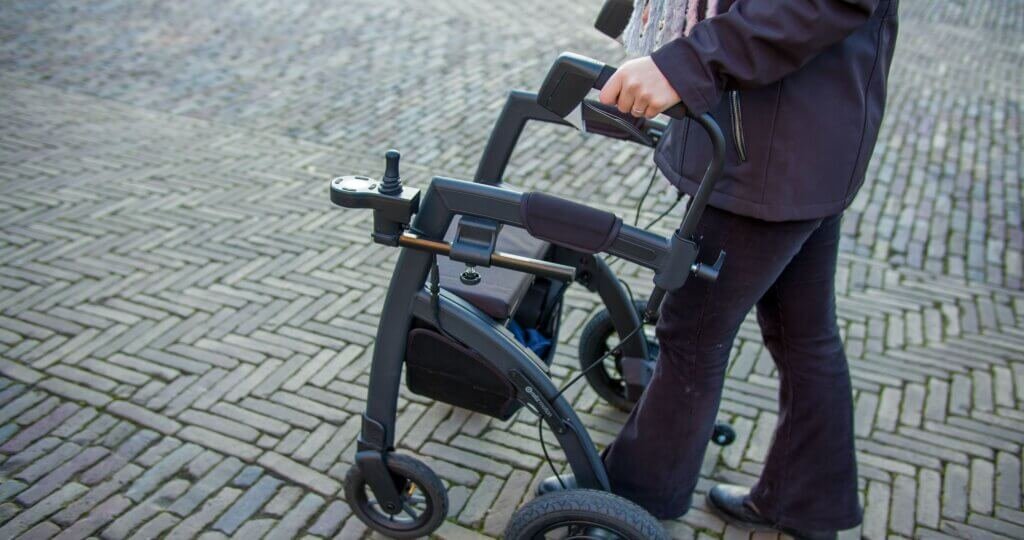 lady taking a walk with her rollator