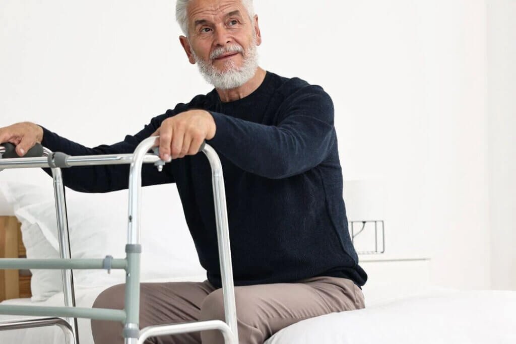 man-using-a-standard-walking-after-hip-surgery