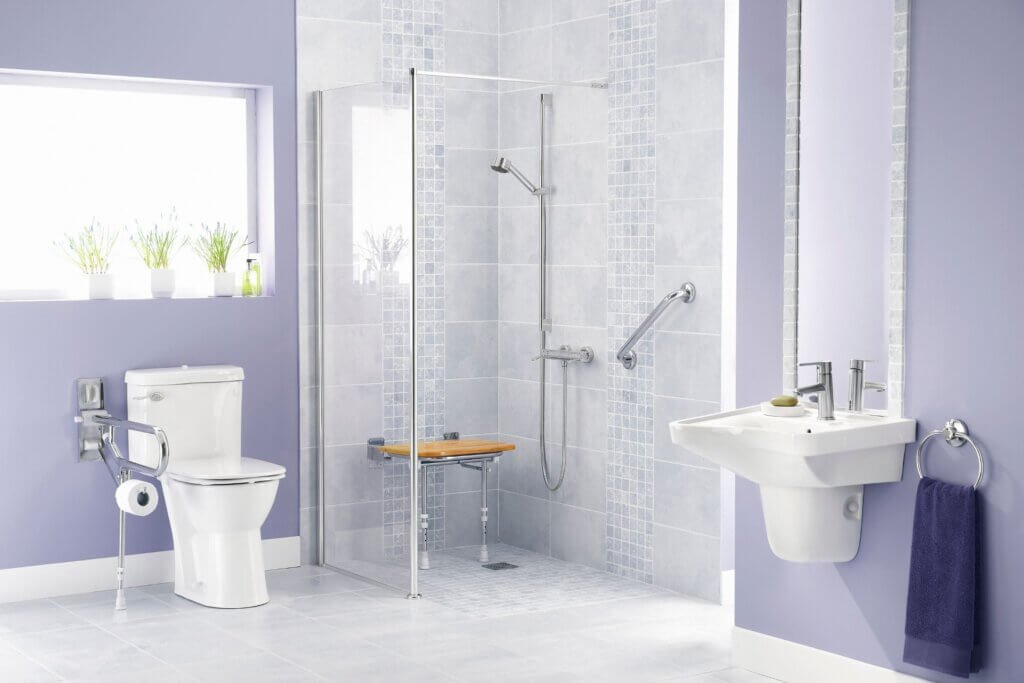 accessible bathroom with grab bars high toilet shower seat