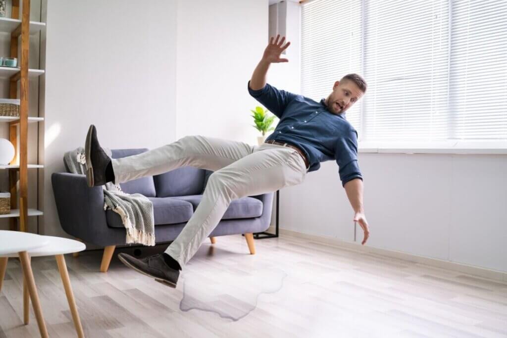 Man slipping on water in his home - Fall prevention in the home