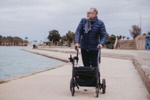 A man enjoying a day out on a walker rollator