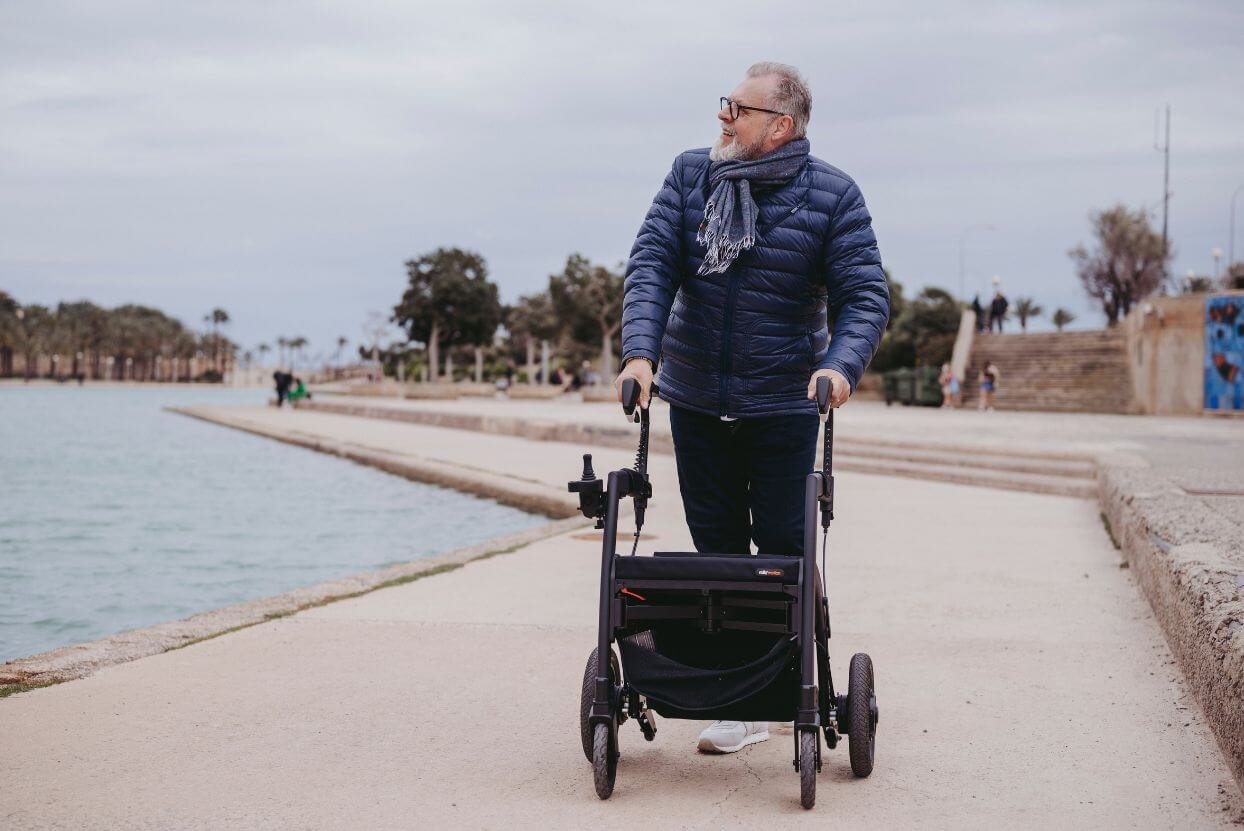 A man enjoying a day out on a walker rollator